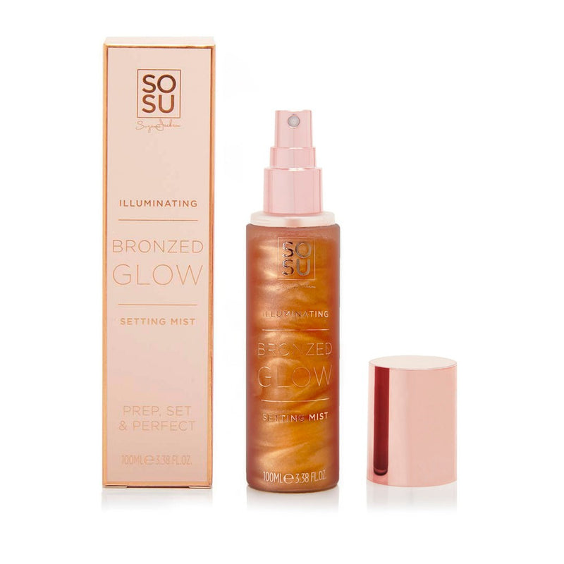 A bottle of SOSU's Illuminating Bronzed Glow Setting Mist, perfect for prepping, setting and illuminating your makeup with a refreshing bronzed glow
