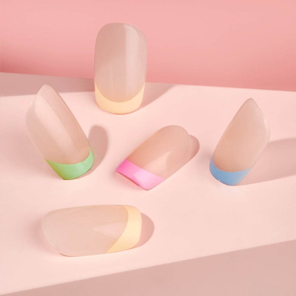 A set of Sweet Dreams Faux Nails by SOSU Cosmetics featuring a square shape, short length, and a summer twist on the classic french tip