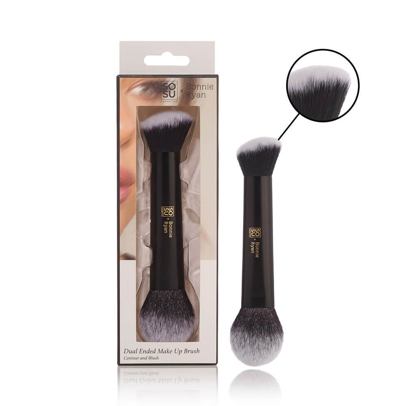 SOSU x Bonnie Ryan Dual-ended Brush displayed in packaging with a close-up of its soft bristles. The brush combines a precise angled end for sculpting and a fluffy end for seamless blending, ideal for cream, liquid, and powder products. Its sleek handle promises a comfortable grip for expert makeup application, capturing the essence of SOSU's commitment to professional quality and radiance.