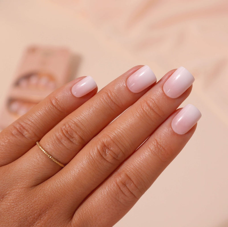 Short square ombre gloss finish nails from Ombre Edge collection, offering salon results in seconds with a nude ombre look for on-trend and groomed looks