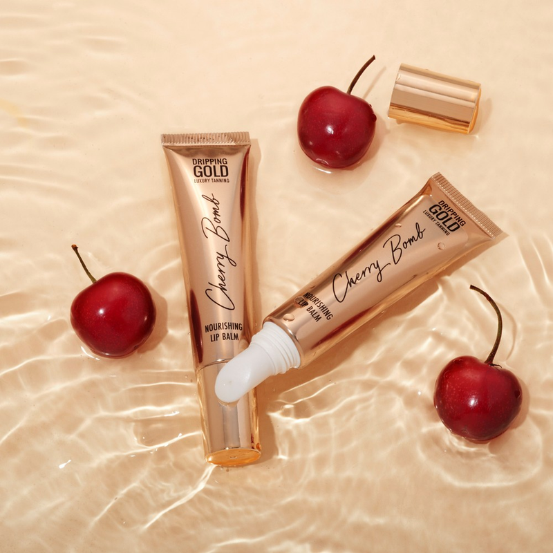 Dripping Gold's Cherry Bomb Lip Balm, a nourishing and moisturising lip care essential with a sweet cherry scent and glossy finish