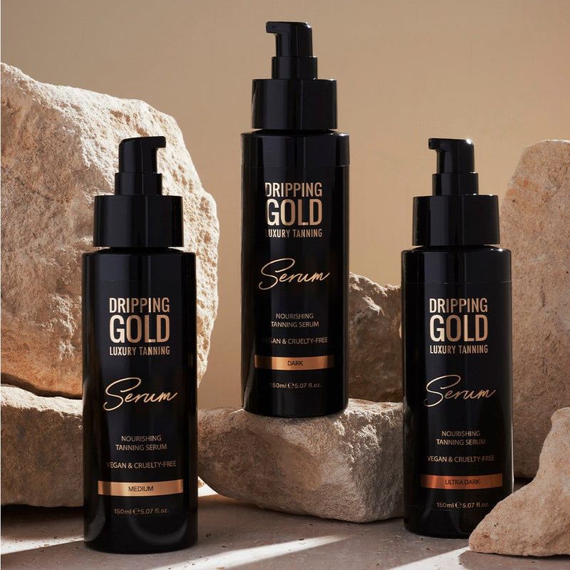 Dripping Gold Luxury Tanning Serum in Medium, Dark and Ultra Dark Shades, enriched with skin-loving ingredients, offers a nourishing and even tan. It is vegan and cruelty-free.