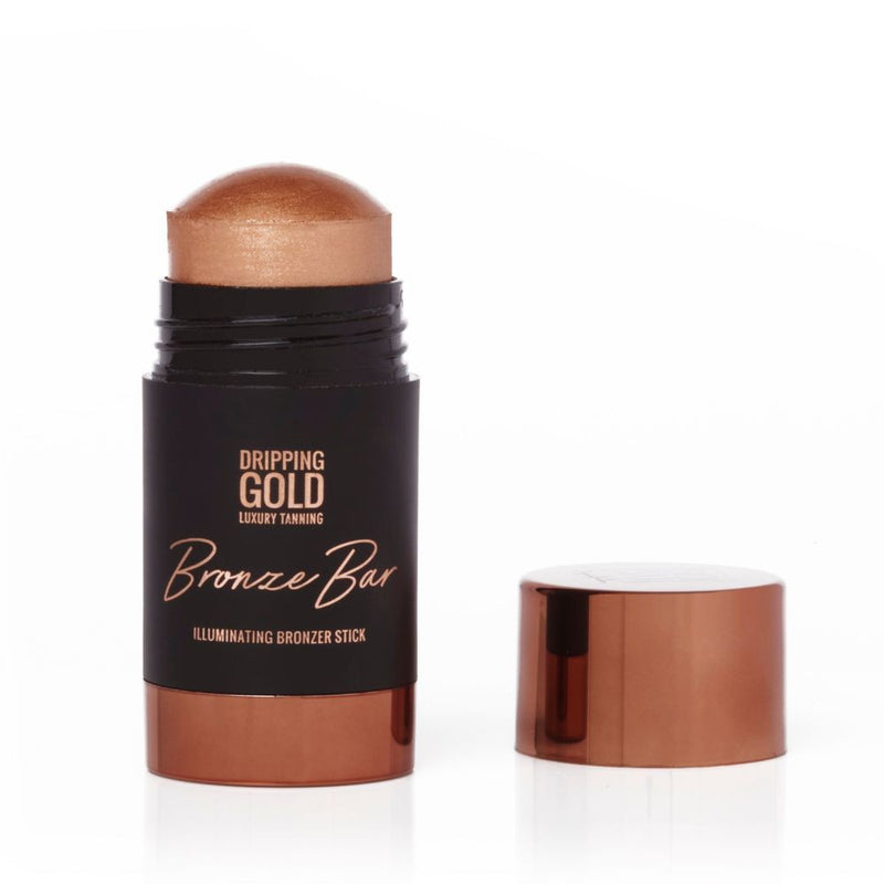 Dripping Gold Bronze Bar Illuminating Bronzer Stick providing a sun kissed glow and glossy finish with a delicious coconut scent