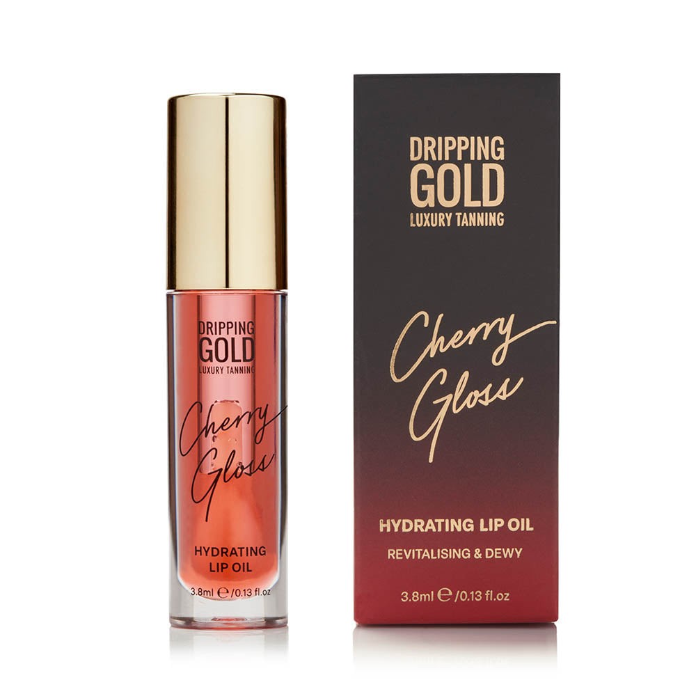 Cherry Gloss Hydrating Lip Oil by SOSU Cosmetics in a bottle, designed to offer ultra-soft, glowy lips with a non-sticky texture, infused with Macadamia Nut Seed Oil and Jojoba Seed Oil