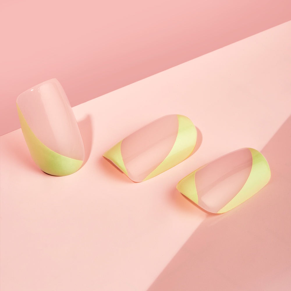 Square-shaped short-length Limelight Faux Nails in statement neon green color, offering salon-quality results with easy application and an extreme gloss finish