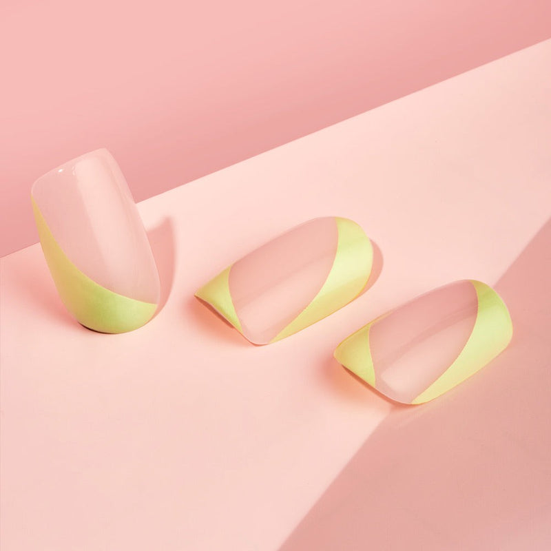Square-shaped short-length Limelight Faux Nails in statement neon green color, offering salon-quality results with easy application and an extreme gloss finish
