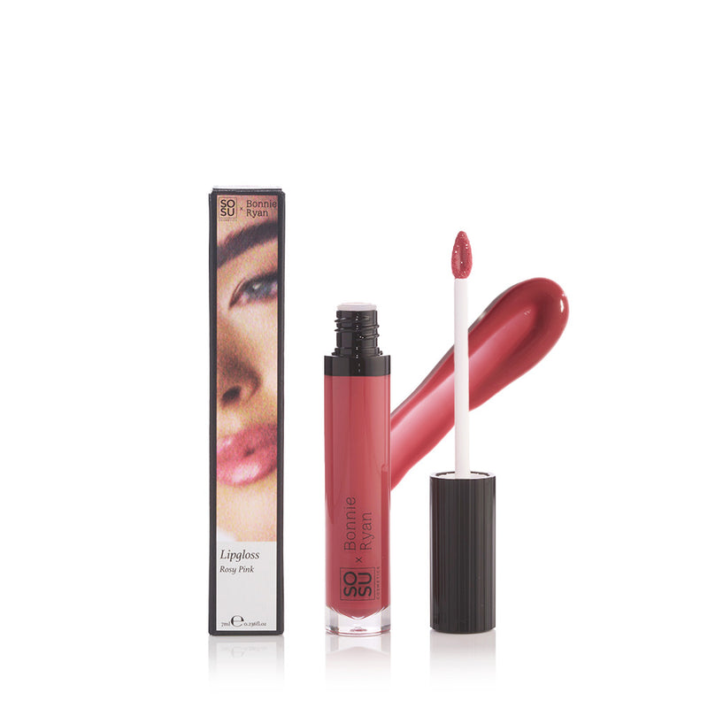 SOSU x Bonnie Ryan rosy pink lip gloss in sleek packaging, showcasing its high-shine finish. Enriched with hyaluronic acid & caster oil, it promises a non-sticky, long-lasting look for lips that stand out.
