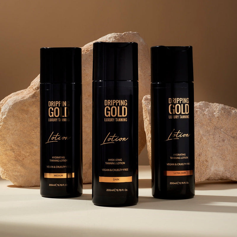 Dripping Gold Luxury Lotion in Medium, Dark, and Ultra Dark shades. This hydrating tanning lotion is vegan and cruelty-free