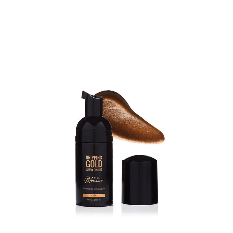 Dripping Gold Luxury Tanning Mini Mousse in Dark shade, travel-friendly tan product for a luscious bronze color and ultra hydration.