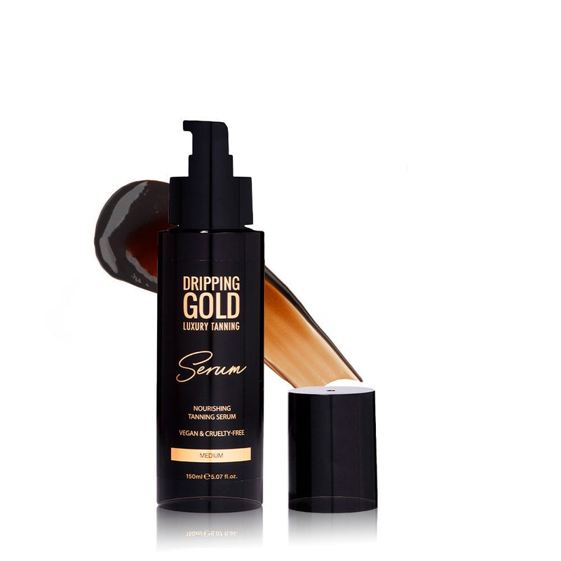 Dripping Gold Luxury Tanning Serum in Medium shade, a nourishing and hydrating skincare product that offers an even, natural-looking tan