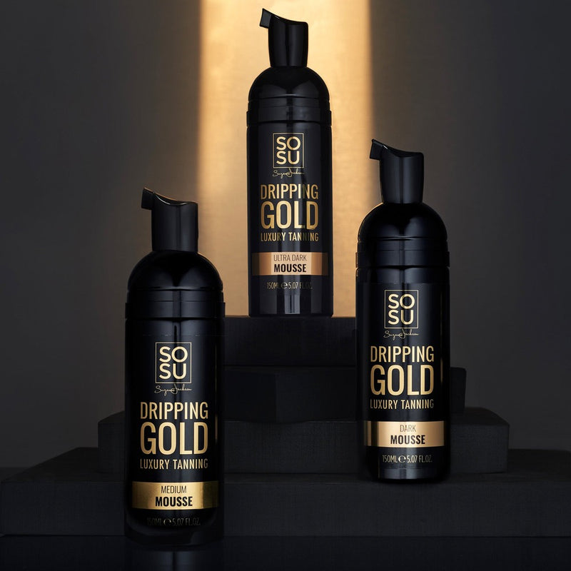 Dripping Gold Luxury Mousse by SOSU in Ultra Dark shade offering intense deep tone, bottled in 150ML packaging, enriched with Vitamin A & E, Hyaluronic Acid, and natural extracts of Goji Berry & Chamomile for healthy bronzed skin