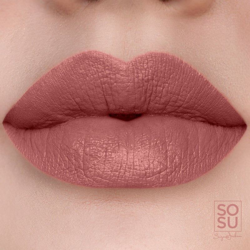 The SOSU Cosmetics Birthday Suit Lip Liner in a neutral-pink hue that adds shape and volume for kissable lips