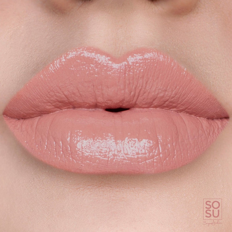Can't Cope Lip Pigment by SOSU Cosmetics, a rosy-nude high shine, non-stick pigment gloss, designed to be long-lasting and infused with conditioning macadamia seed oil