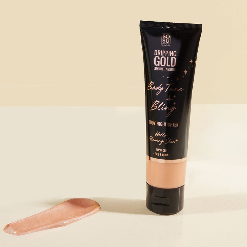 Dripping Gold Body Tune Bling Illuminating Cream Highlighter in a bottle, promising champagne gold/pink sheen for face and body with wash-off formula
