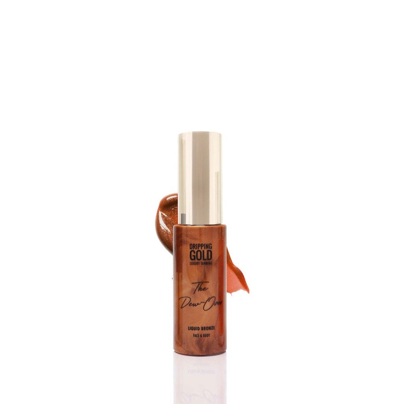 Dripping Gold Liquid Bronze, a luxurious tanning product for face and body, promising a natural, dewy glow