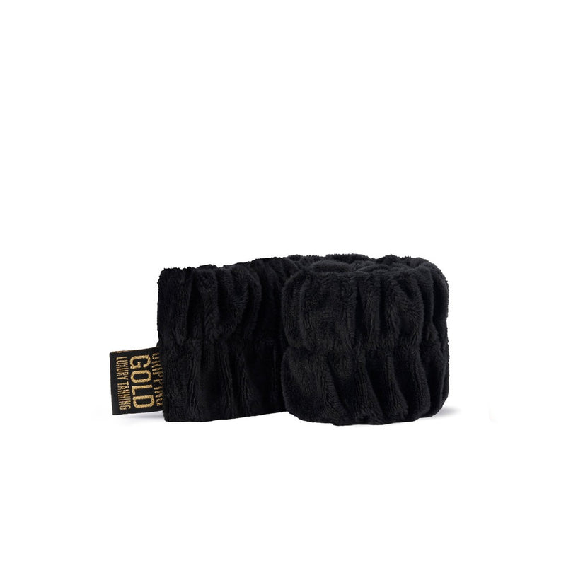 Dripping Gold Luxury Spa Headband in black, elasticated and soft on the skin, perfect for keeping hair off the face during skincare or makeup application