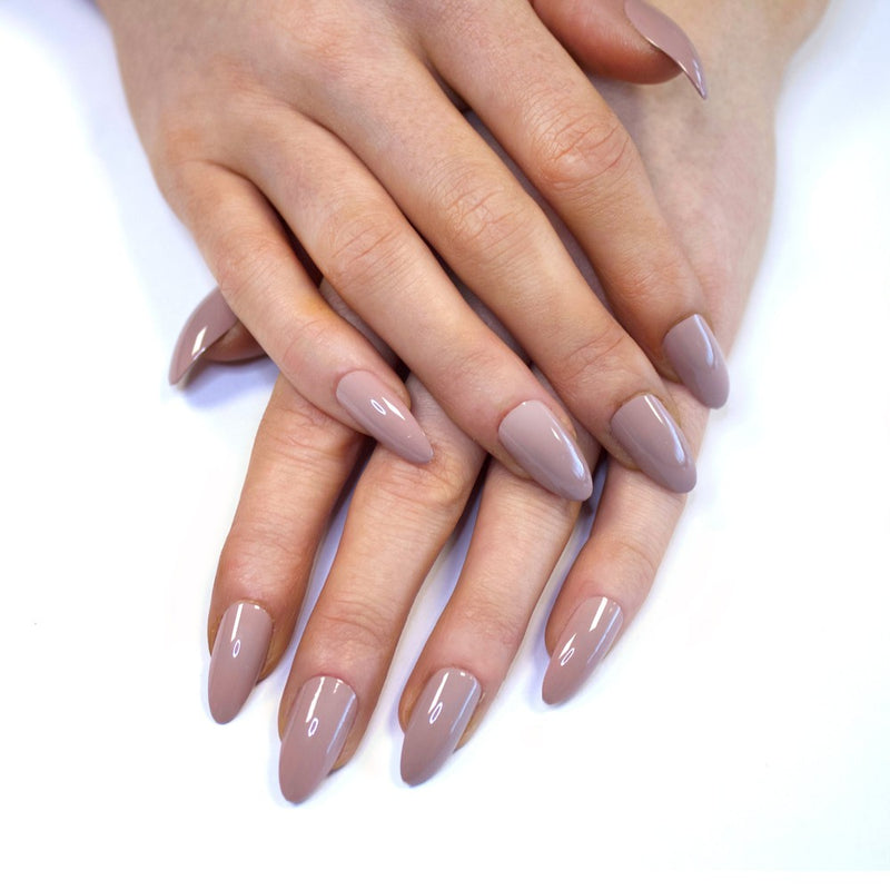 SOSU Cosmetics 'Nudist' nails with a modern almond shape, extreme gloss finish, and medium length, for salon nails in seconds