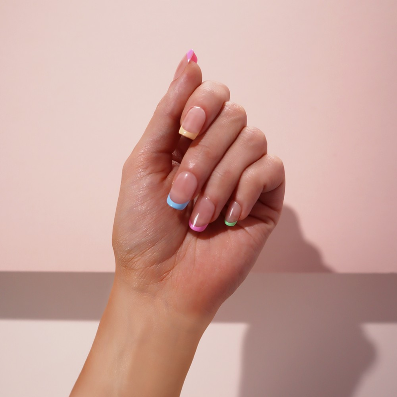 Square-shaped, short length Sweet Dreams Faux Nails offering a summer twist on the classic french tip for a stunning, salon-quality result in seconds