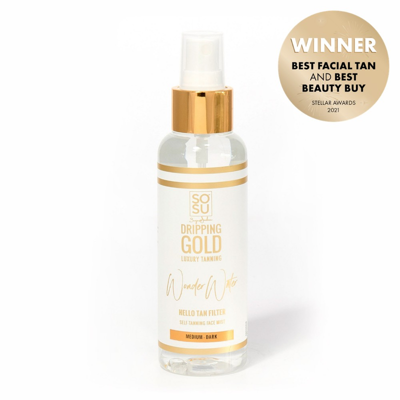 Award-winning Dripping Gold Wonder Water Medium-Dark, a super-hydrating facial tan mist that gives a deep golden glow and perfect makeup base