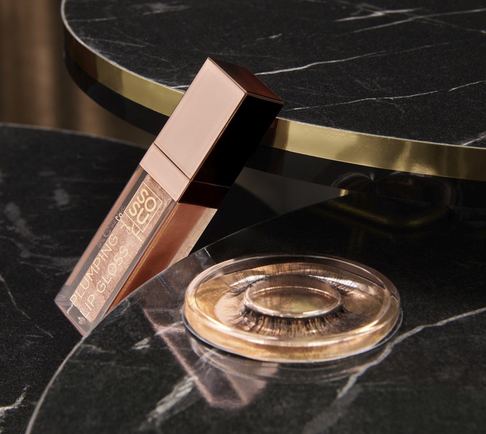 Kisses & Lashes Peach Lust set featuring a shimmer lip gloss and luxury synthetic lashes, perfect for creating a super-luxe 3-dimensional pout